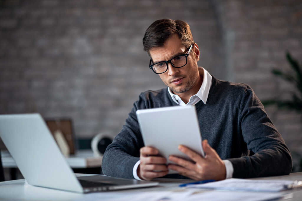 Man accountant works with documents